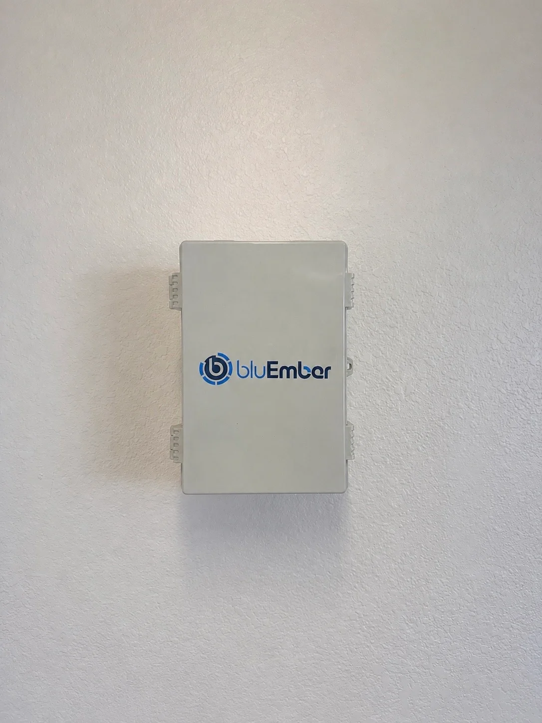 bluEmber control box mounted on an indoor garage wall