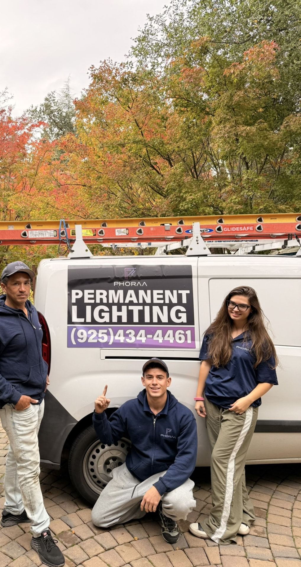 The Phoraa Lighting install team standing beside the company van in Danville, CA